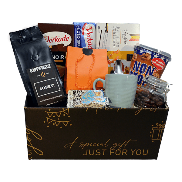 Luxe 'Sorry' cadeaupakket met koffie, mok, chocolade, koekjes en snoepjes verpakt in een stijlvolle geschenkdoos